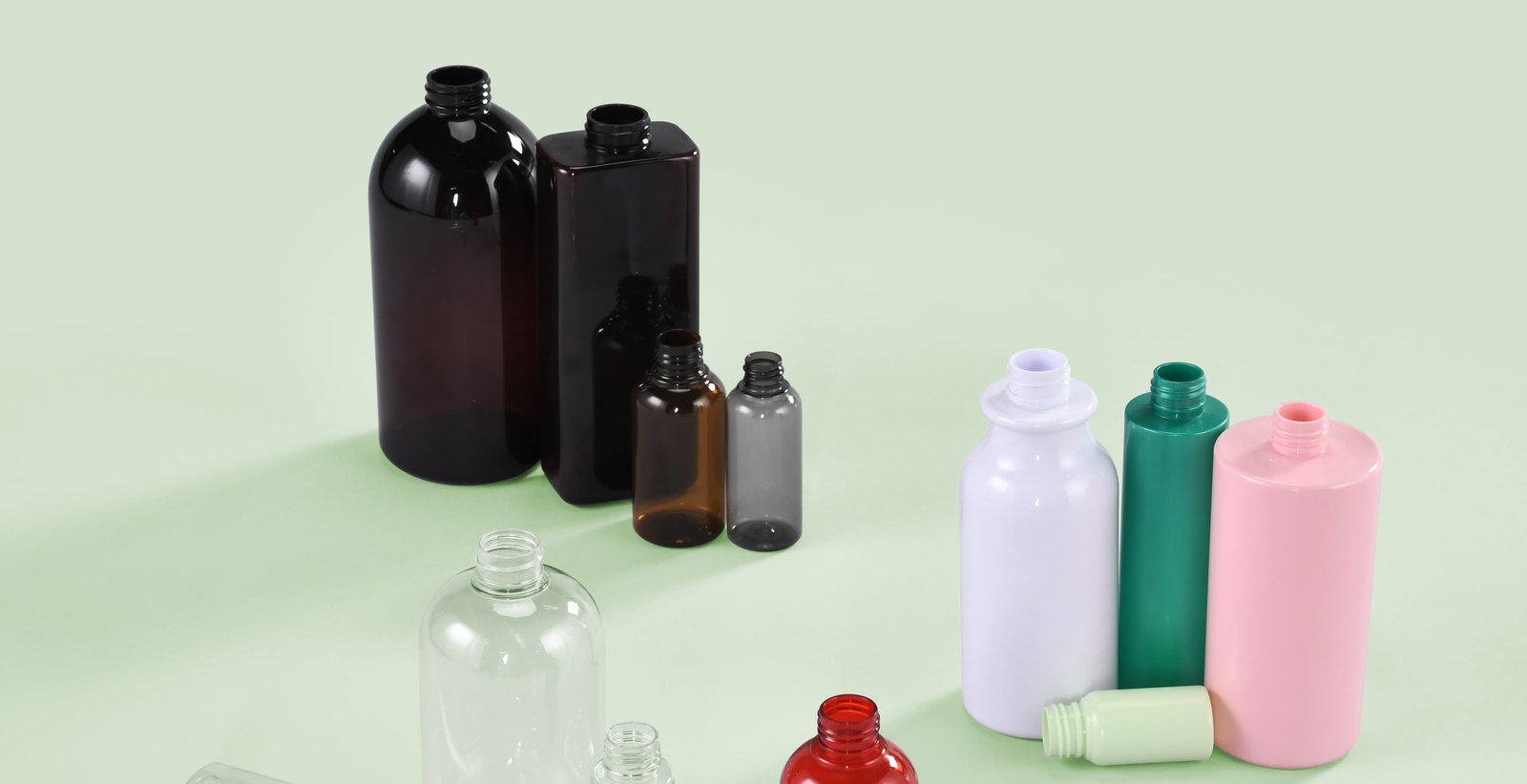 PET bottles in amber, white, green and pink